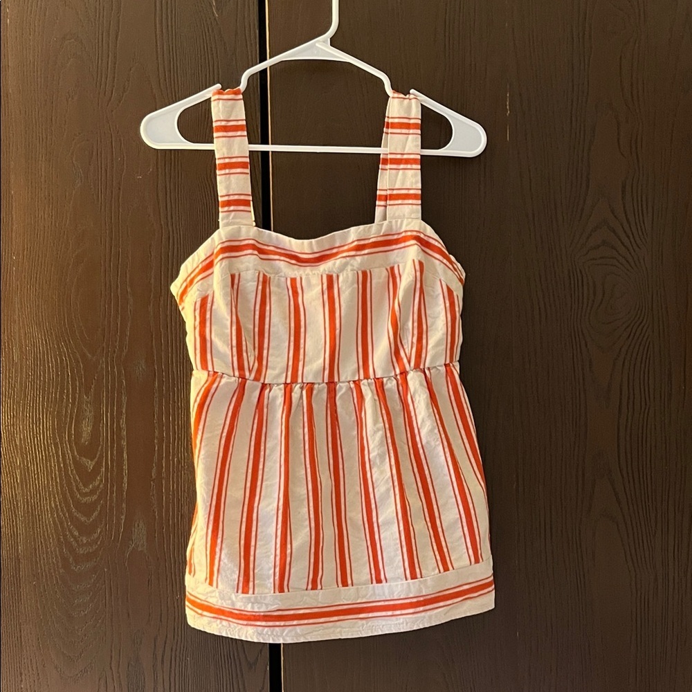 Cabi strapped cream and orange striped top.
Size Small